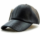 Black leather winter baseball cap for men with embossed concave logo and detailing