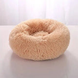 Comfortable coral fleece round pet bed for furry friend in beige plush