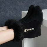 Black suede platform snow boot with fur trim, crystal pin, height increasing insoles