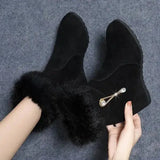Black suede ankle snow boots with furry trim, crystal brooch, height increasing insoles