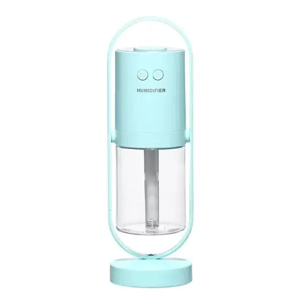 Mint-colored Magic Shadow USB air humidifier with clear tank, handle, night light and projection