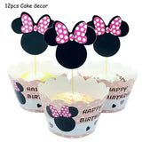 Minnie Mouse decorations: cupcakes with black ears, pink polka dot bows, Happy Birthday wrappers for Disney birthday parties