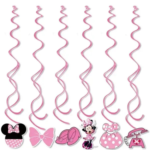Pink Minnie Mouse decorations with spiral party supplies for Disney birthday
