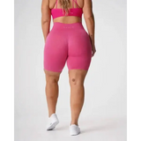 Nvgtn Seamless Pro spandex shorts in hot pink high-waisted biker style