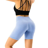Nvgtn Seamless Pro Spandex Shorts in light blue fitted design