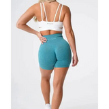 Nvgtn Seamless Pro spandex shorts in teal with high waistband