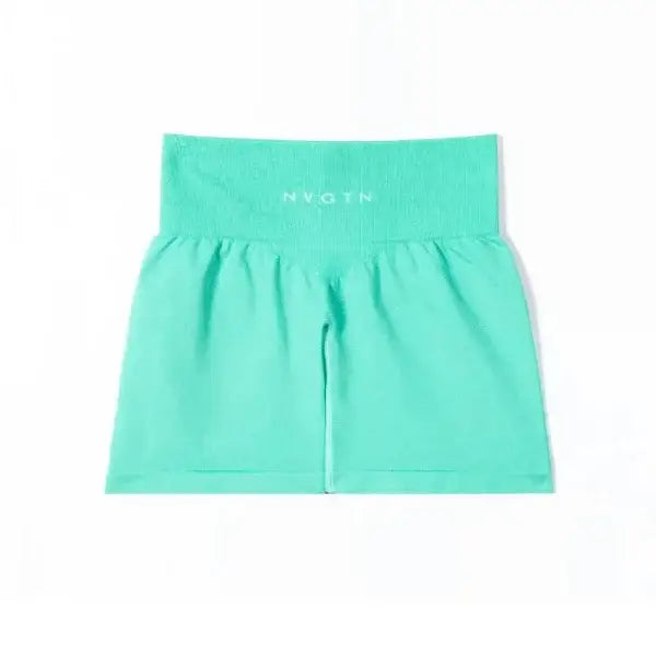 Nvgtn Seamless Pro Spandex Shorts in mint green with wide elastic waistband
