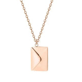 Rose gold love letter pendant necklace on delicate chain