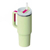 Premium stainless steel vacuum coffee cup: mint green insulated tumbler with pink handle and white straw