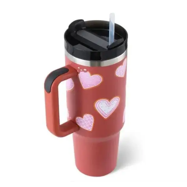Pink premium stainless steel vacuum coffee cup with heart patterns and handle