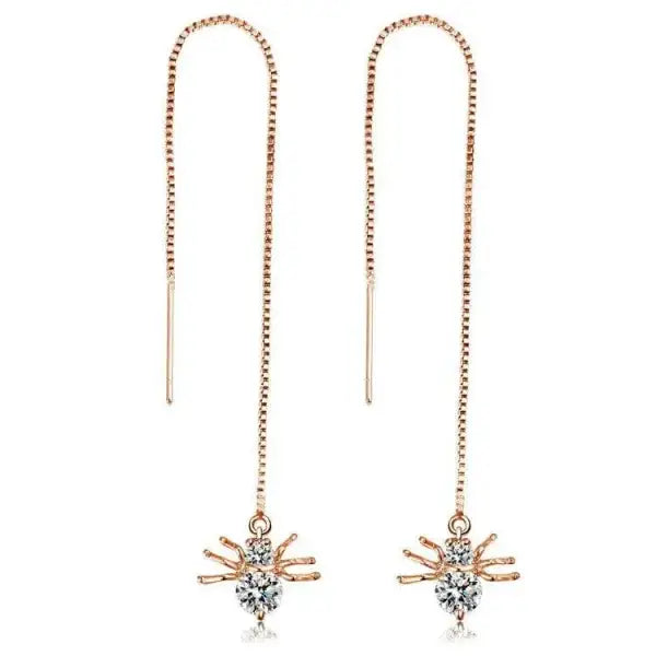 Rose gold shining star tassel earrings with crystal starburst pendants