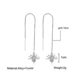 Delicate shining star tassel earrings with crystal starburst designs