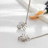 Elegant shining star tassel earrings with silver spider pendant and crystal accents