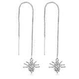 Silver star tassel earrings with crystal starburst threader design