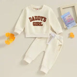 Cream-colored stylish infant clothing sweatsuit with DADDY’S GIRL text