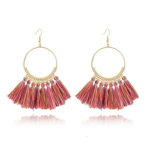 Stylish round drop dangle earrings with gold hoops and pink orange tassels