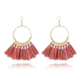 Stylish round drop dangle earrings with gold hoops and pink orange tassels