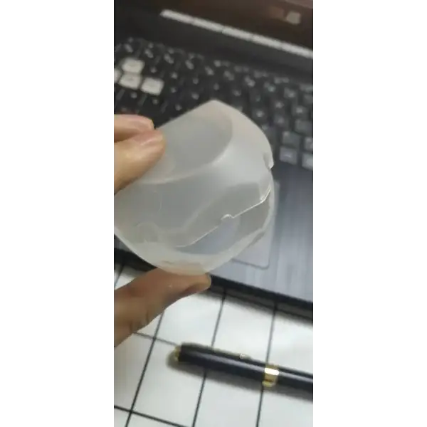 Translucent curved silicone waterproof toothbrush for ultimate protection in wet conditions