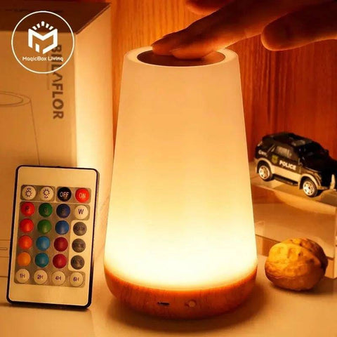 Color-changing LED night lamp with white shade and wooden base for a modern touch