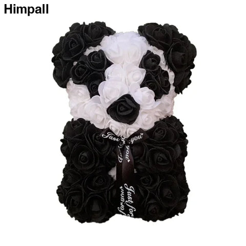 Panda-shaped 25cm rose teddy bear crafted from black and white artificial flowers