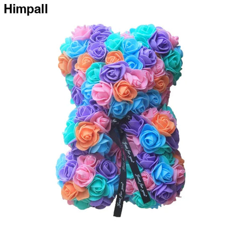 25cm Rose Teddy Bear in vibrant turquoise, purple, pink, and coral artificial flower bear