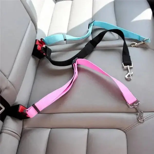 Army green adjustable dog seat belt in pink and turquoise with metal clips