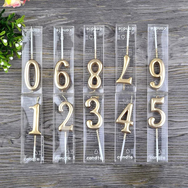 Gold-colored number candles in clear packaging for Champagne Gold Paraffin Candle