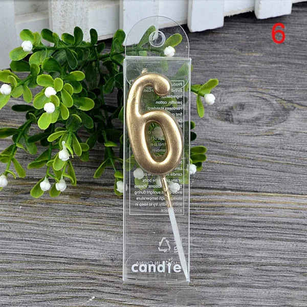 Gold metallic number 6 birthday candle in clear packaging for Champagne Gold Paraffin Candle