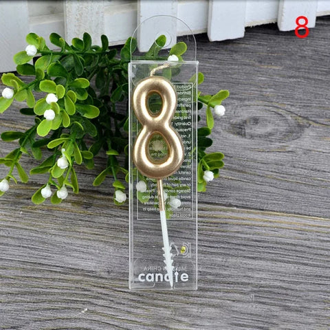 Gold number 8 birthday candle on clear holder from Champagne Gold Paraffin Candle