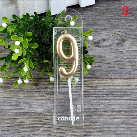 Gold number 9 birthday candle in clear packaging for Champagne Gold Paraffin Candle