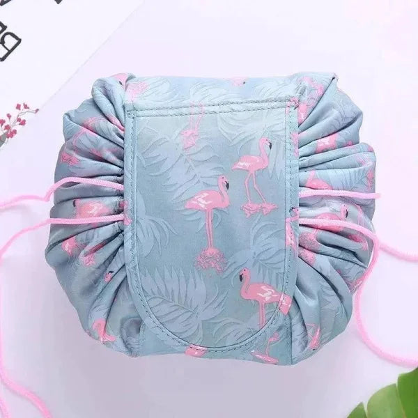 Chic Cosmetic Bag with Waterproof Drawstring, featuring Pink Flamingo Pattern on Blue Fabric