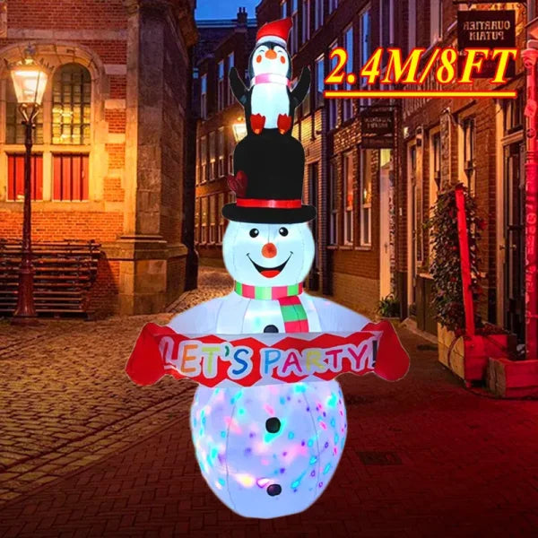 Illuminated Christmas decoration featuring a snowman with LED lights and penguin accent