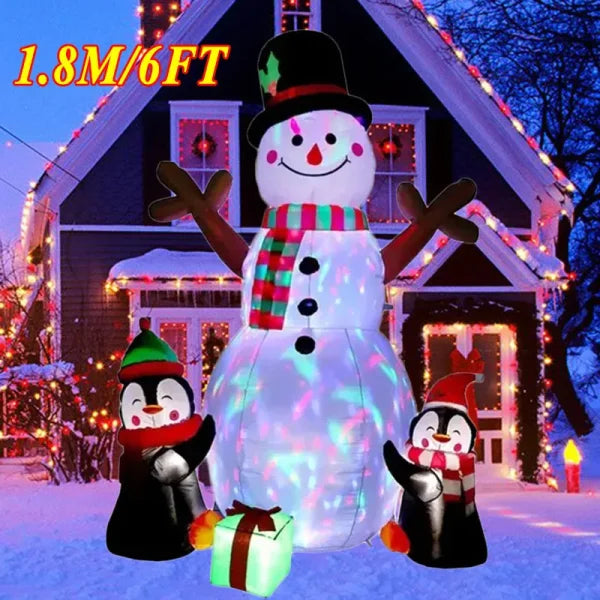 Illuminated inflatable snowman with penguins, perfect for creating a festive Christmas atmosphere