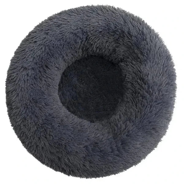 Round pet bed made of comfortable coral fleece for your furry friend in dark gray