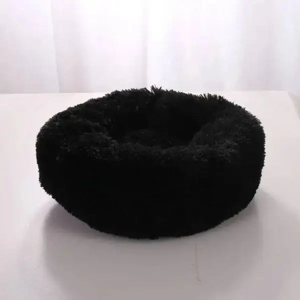 Fluffy black round pet bed in comfortable coral fleece for furry friend