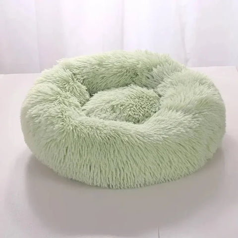 Mint green fluffy round pet bed in plush coral fleece for your furry friend