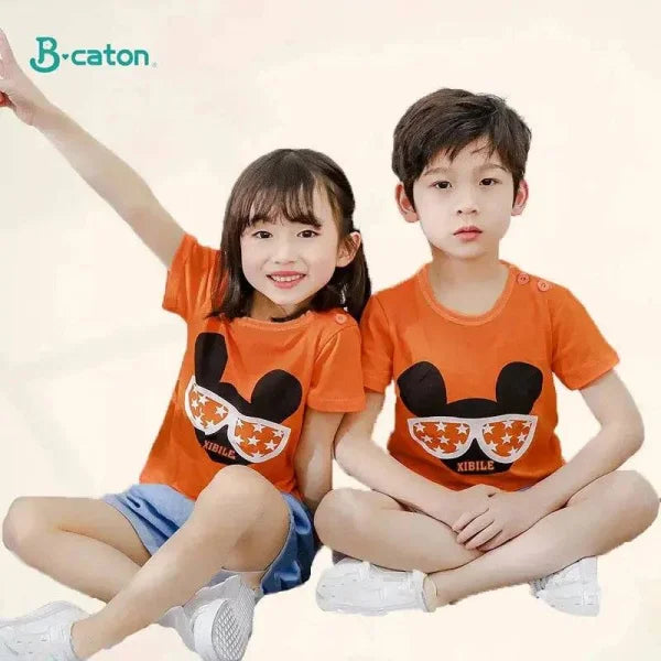 Two kids in matching cotton cartoon summer t-shirts, 4T-5T