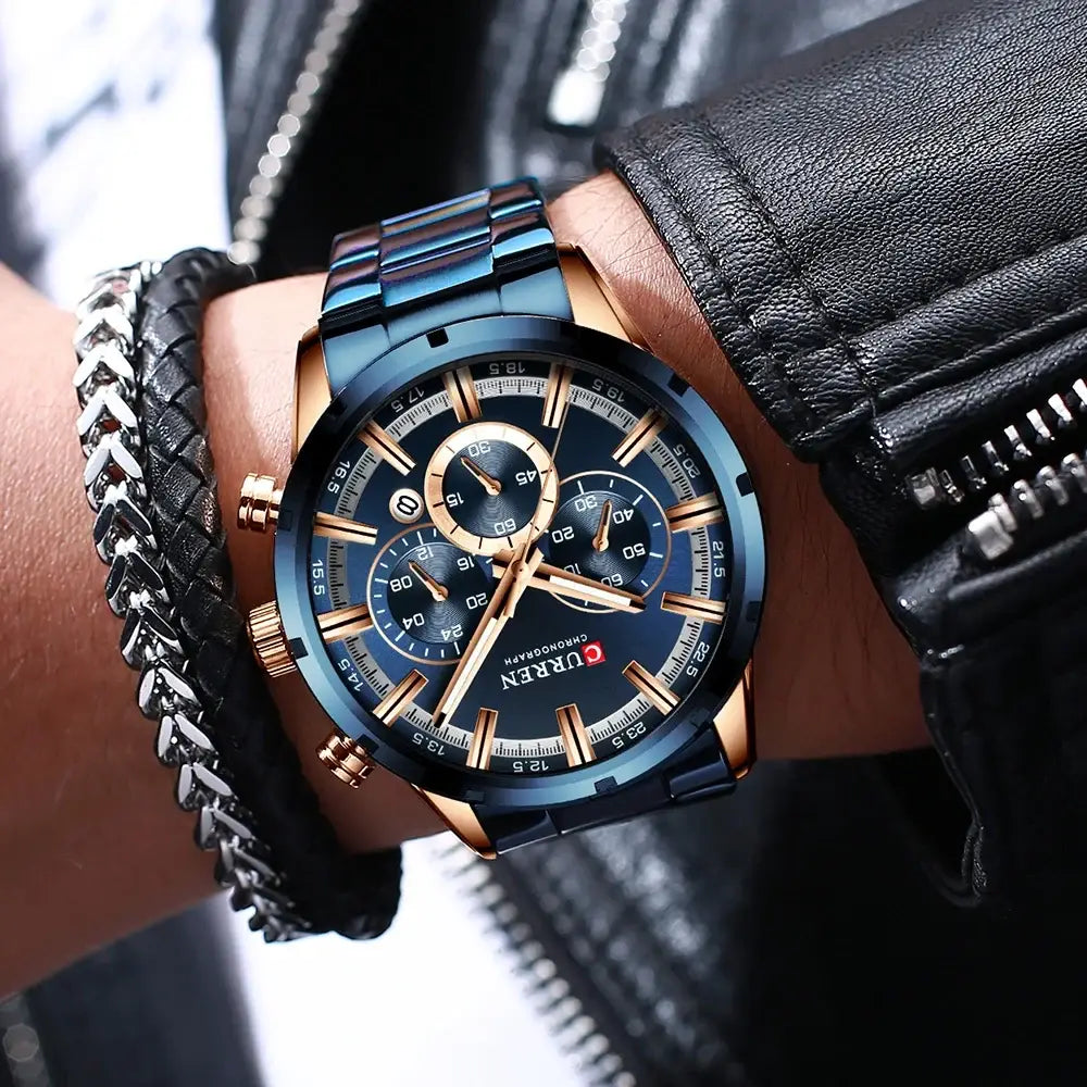 Blue dial curren chronograph watch with rose gold accents and stainless steel band for business wear