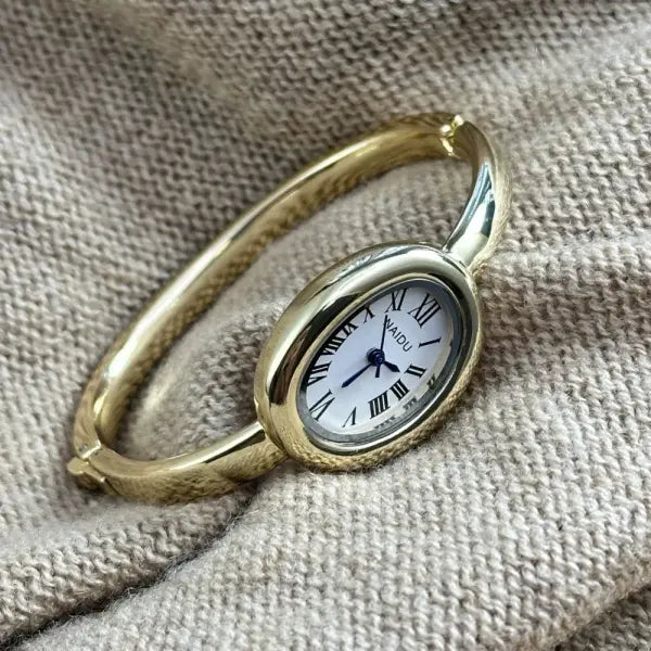 Famous Brand Bracelet Watch with Oval Case and Stainless Steel Strap