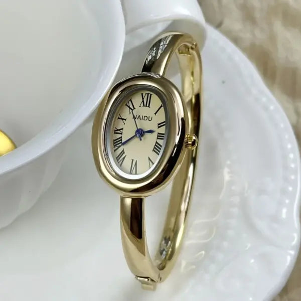 Famous Brand Bracelet Watch with Oval Case and Stainless Steel Strap