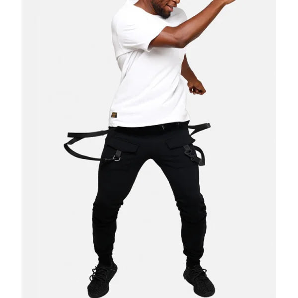 Man in white t-shirt and black fitness pant men sweatpants with harnesses