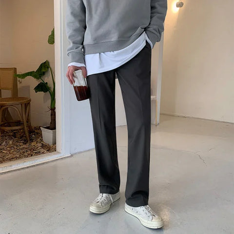Men’s Solid Color Casual Pants in Comfortable Cotton Blend styled with a gray sweatshirt