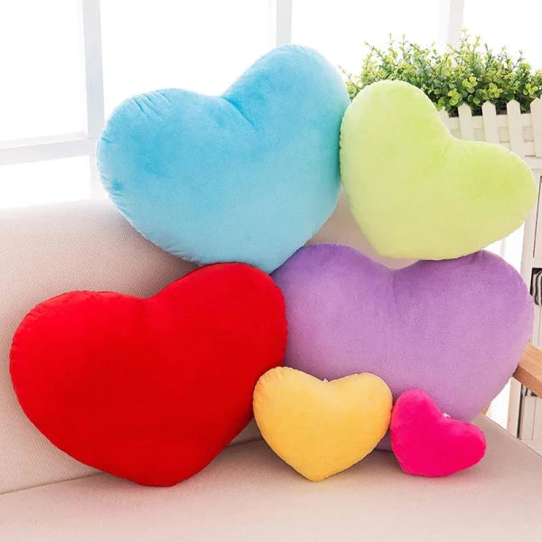 Colorful heart-shaped seat cushions for Valentine’s Day decorating in vibrant hues