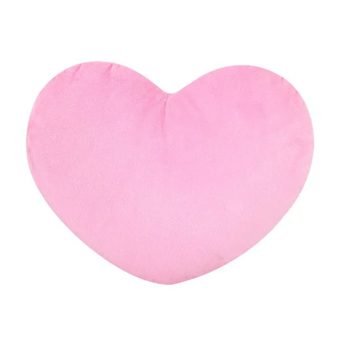 Pink heart-shaped seat cushion ideal for Valentine’s Day decorating or as a sleeping pillow