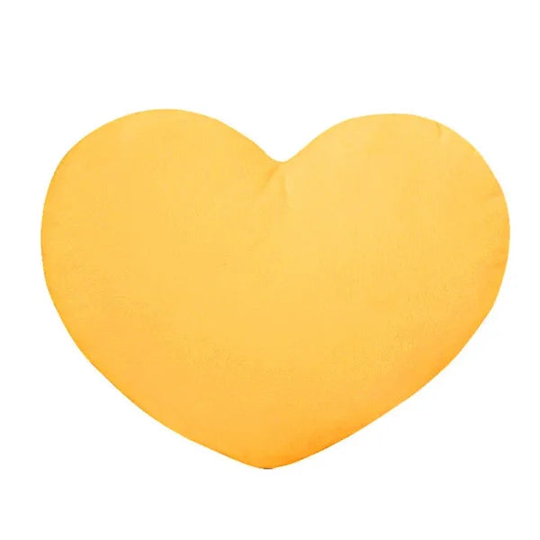 Yellow heart-shaped seat cushion for Valentine’s Day decorating on white background