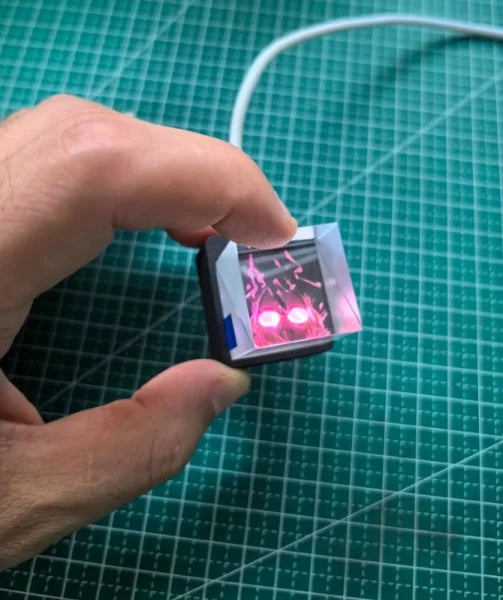 Small electronic device with red LEDs showcasing modern simplicity function for global city weather and time display