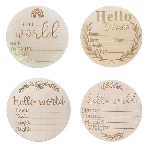 Four wooden birth announcement plaques with Hello World text, natural wood chips design