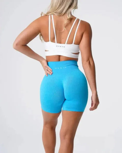 Bright blue Nvgtn Seamless Pro spandex shorts with a fitted silhouette for men and women
