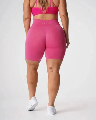 Hot pink high-waisted Nvgtn Seamless Pro Spandex Shorts for men and women
