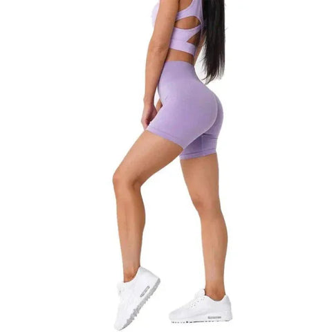 Lavender Nvgtn Seamless Pro Spandex Shorts with high-waisted, form-fitting design